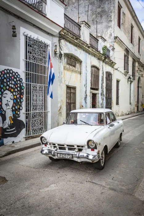 Framed Print : Classic car driving in a narrow street in La Habana Vieja (Old Town), Havana, Cuba