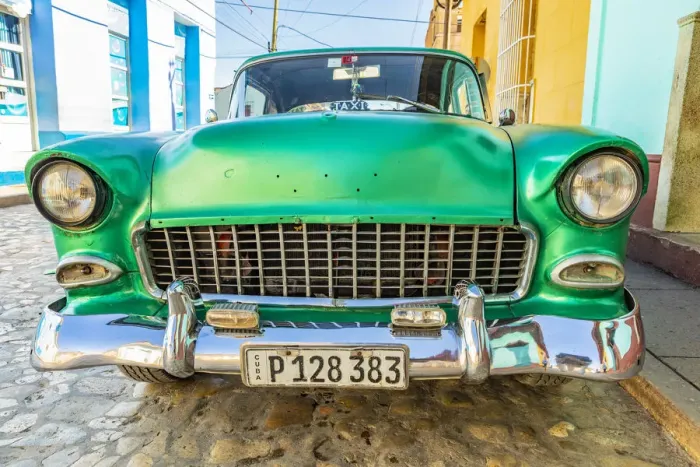 Framed Print : A classic car parked in a street in Trinidad, Sancti Spiritus, Cuba