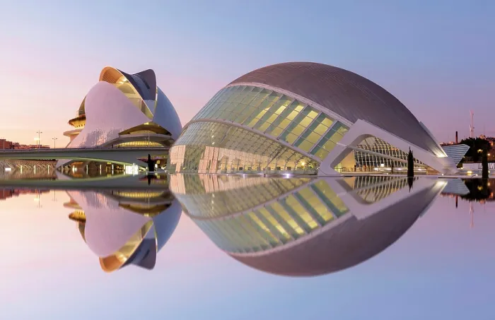 Framed Print : Classic view of the Ciudad de los artes y ciencias (City of Arts and Sciences) reflecting in a shallow pool of water at dawn, Valencia, Spain Framed Print : Classic view of the Ciudad de los artes y ciencias (City of Arts and Sciences) reflecting in a shallow pool of water at dawn, Valencia, Spain