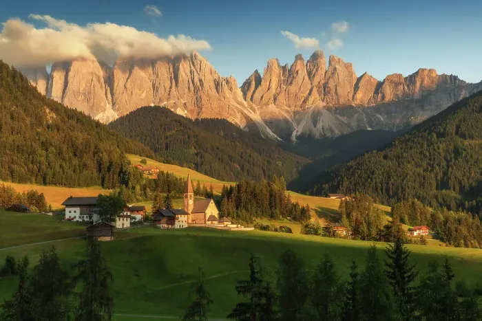 Framed Print : The classic view of the Santa Magdalena church during a summer sunset, with the Odle rising tall in the background. Dolomites, Italy Framed Print : The classic view of the Santa Magdalena church during a summer sunset, with the Odle rising tall in the background. Dolomites, Italy