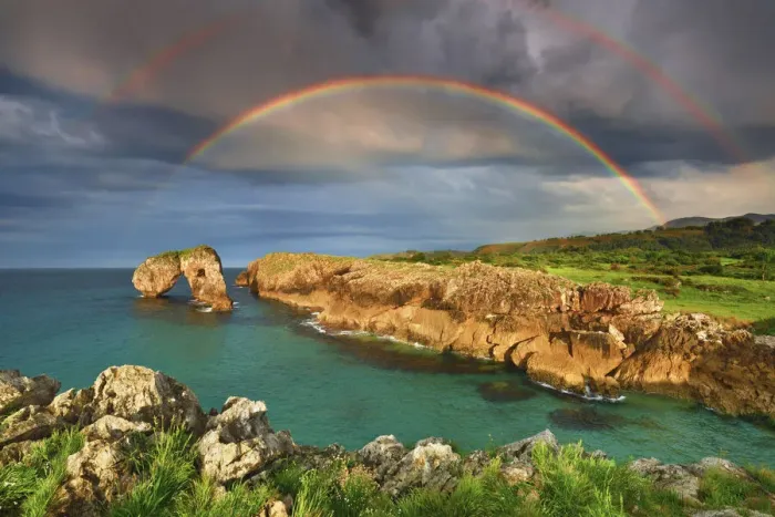 Framed Print : Cliff landscape with rock arch under rainbow - Spain, Asturias, Oriente, Ribadesella Framed Print : Cliff landscape with rock arch under rainbow - Spain, Asturias, Oriente, Ribadesella