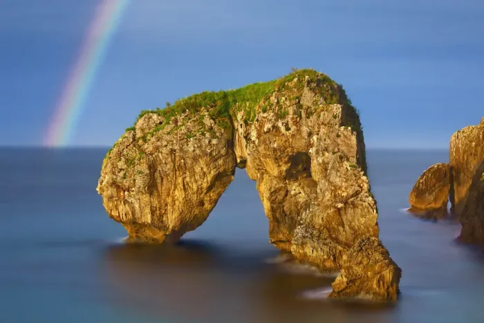Framed Print : Cliff landscape with rock arch under rainbow - Spain, Asturias, Oriente, Ribadesella Framed Print : Cliff landscape with rock arch under rainbow - Spain, Asturias, Oriente, Ribadesella