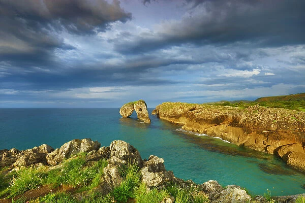 Cliff landscape with rock arch - Spain, Asturias, Oriente, Ribadesella
