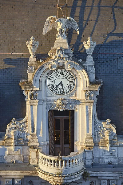 Detail of the clock of 'La Prensa'building (Beaux Arts) at sunset on Avenida de Mayo, Monserrat, Buenos Aires, Argentina. Once the headquarters of the 'La Prensa'Daily Newspaper
