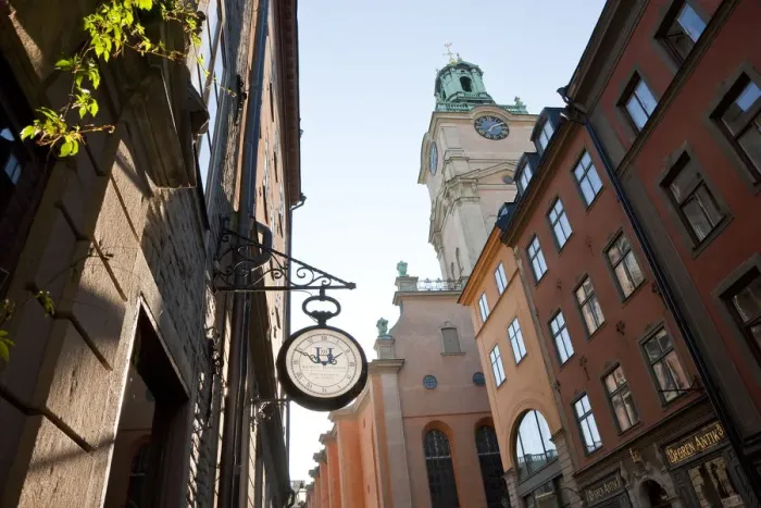 Framed Print : Clock outside shop & The clocktower of Storkyrkan (The Great Church), Gamla Stan Framed Print : Clock outside shop & The clocktower of Storkyrkan (The Great Church), Gamla Stan