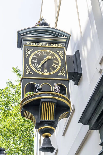 Clock at Pied Bull Yard, Bloomsbury, London, England, UK
