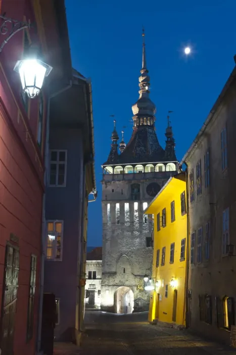 Framed Print : Clock Tower illuminated at dusk, Sighisoara, Transylvania, Romania Framed Print : Clock Tower illuminated at dusk, Sighisoara, Transylvania, Romania