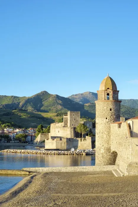 Framed Print : Clocktower of Notre-Dame-des-Anges church and the Chateau Royal de Collioure Framed Print : Clocktower of Notre-Dame-des-Anges church and the Chateau Royal de Collioure