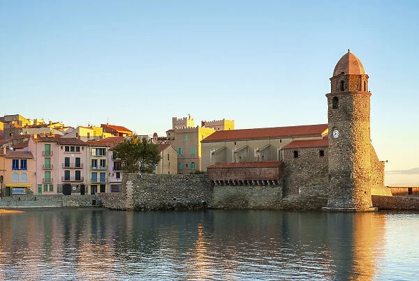Clocktower of Notre-Dame-des-Anges church at sunrise, Collioure, Pyra na es-Orientales