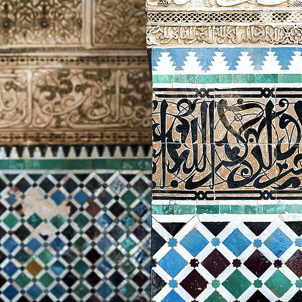 Close up of decorated ancient walls with ceramic tiles and carved Arabic script, Fez, Morocco