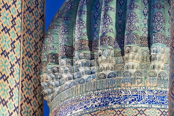 Close up of Sherdar, Cher Dor, Madrasah dome by night. Registan square, Samarkand