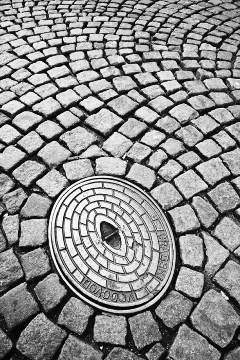 Framed Print : Close-up deatil showing cobbled street and manhole cover, Ljubljana, Slovenia Framed Print : Close-up deatil showing cobbled street and manhole cover, Ljubljana, Slovenia