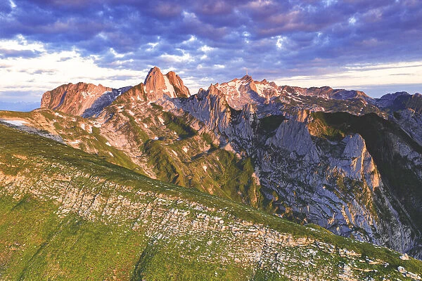 Clouds at dawn on rocky peaks of Santis and Saxer Lucke mountains, Appenzell Canton