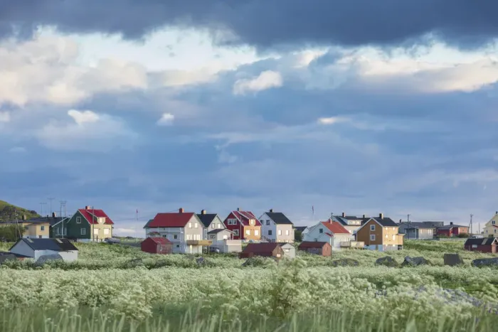 Framed Print : Clouds and midnight sun frames the typical houses of the fishing village Eggum Unstad Vestvagoy Lofoten Islands Norway Europe Framed Print : Clouds and midnight sun frames the typical houses of the fishing village Eggum Unstad Vestvagoy Lofoten Islands Norway Europe