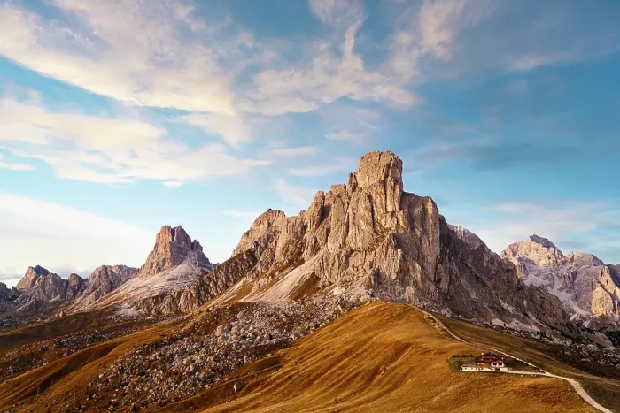 Framed Print : Clouds over an empty mountain road at Giau pass at feet of majestic Ra Gusela during the autumn sunset, Dolomites, Veneto, Italy Framed Print : Clouds over an empty mountain road at Giau pass at feet of majestic Ra Gusela during the autumn sunset, Dolomites, Veneto, Italy