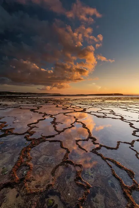 Framed Print : Clouds Refelcting in Tide Pools at Sunset, Vila Nova de Milfontes, Alentejo, Portugal Framed Print : Clouds Refelcting in Tide Pools at Sunset, Vila Nova de Milfontes, Alentejo, Portugal