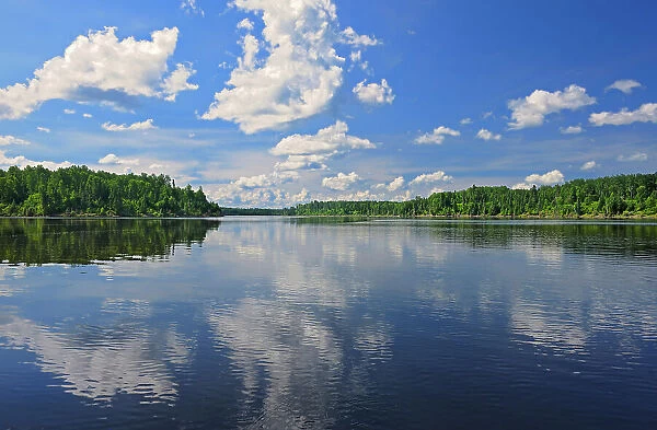 Clouds reflected in the English River, Ear Falls, Ontario, Canada