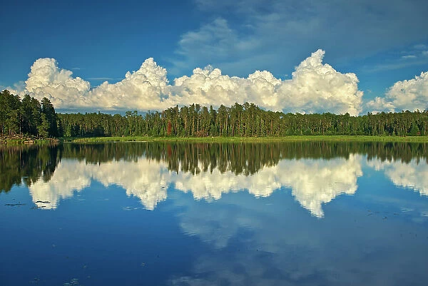 Clouds reflected in Isabel Lake Kenora, Ontario, Canada