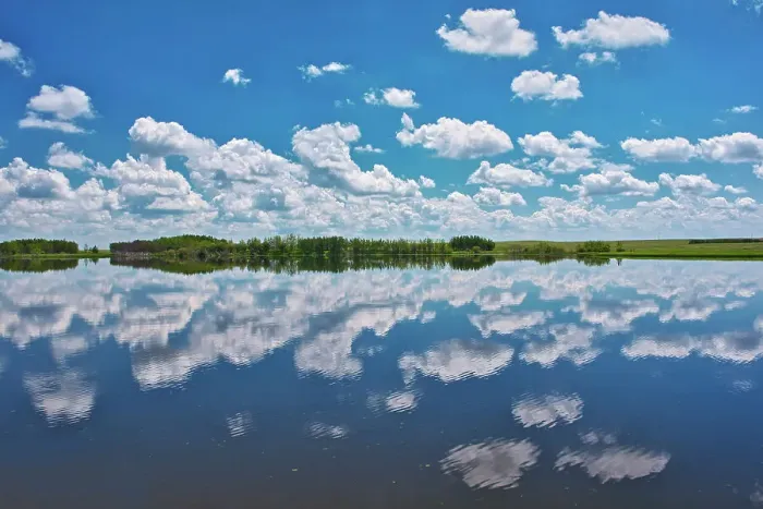 Framed Print : Clouds reflected in prairie slough, Alberta, Canada Framed Print : Clouds reflected in prairie slough, Alberta, Canada