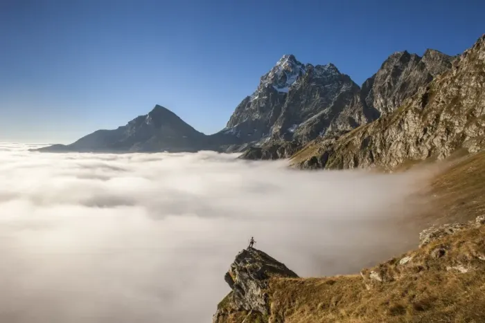 Framed Print : A clouds sea, in autumn, under Monviso peak and Viso Mozzo peak, with an alpinist on a pulpit rock Framed Print : A clouds sea, in autumn, under Monviso peak and Viso Mozzo peak, with an alpinist on a pulpit rock