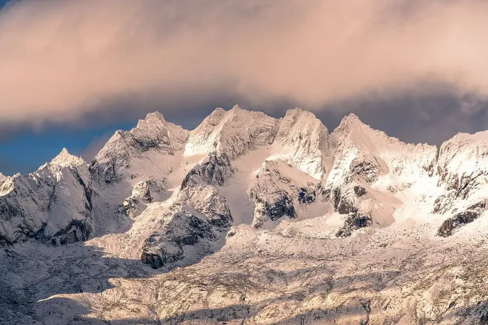 Framed Print : Clouds over snowy mountain peaks in autumn, Valle Del Ferro, Valmasino, Sondrio province, Lombardy, Italy Framed Print : Clouds over snowy mountain peaks in autumn, Valle Del Ferro, Valmasino, Sondrio province, Lombardy, Italy