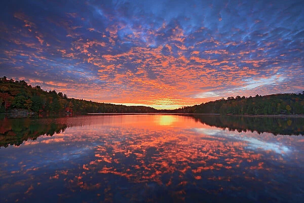 Clouds at sunrise on Raven Lake Dorset, Ontario, Canada