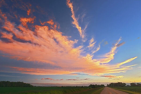 Clouds at sunset over farmer's field Lorette, Manitoba, Canada