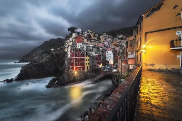 Framed Print : Cloudy evening over the village of Riomaggiore, National Park of Cinque Terre Framed Print : Cloudy evening over the village of Riomaggiore, National Park of Cinque Terre