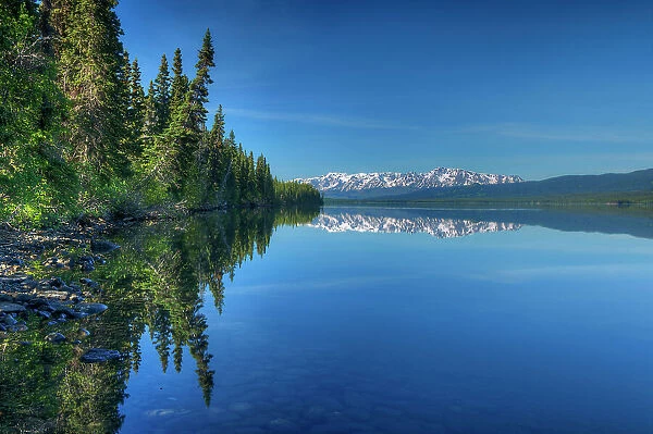 Coast Mountains reflected in Kinaskan Lake along the Stewart Cassiar Highway, British Columbia, Canada