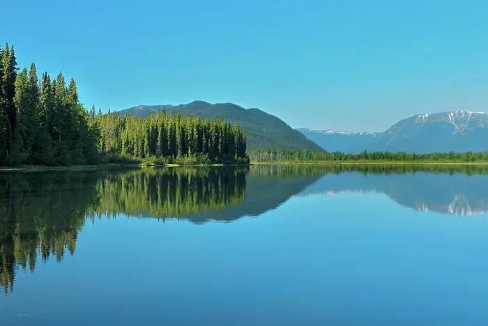 Framed Print : Coast Mountains reflected in Tattoga Lake near Iskut along the Stewart Cassiar Highway, British Columbia, Canada