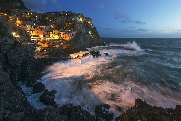 Coastal town of Manarola at blue hour, Cinque Terre, Liguria, Italy