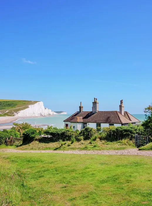 Framed Print : Coastguard Cottage and Seven Sisters Cliffs, Cuckmere Haven, East Sussex, England, United Kingdom Framed Print : Coastguard Cottage and Seven Sisters Cliffs, Cuckmere Haven, East Sussex, England, United Kingdom