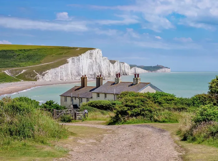 Framed Print : Coastguard Cottage and Seven Sisters Cliffs, Cuckmere Haven, East Sussex, England, United Kingdom Framed Print : Coastguard Cottage and Seven Sisters Cliffs, Cuckmere Haven, East Sussex, England, United Kingdom