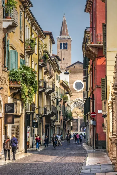Framed Print : Cobblestone street in the historical city center with SantaaAnastasia church in