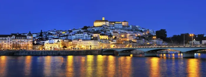 Framed Print : Coimbra and the Mondego river at sunset. Portugal