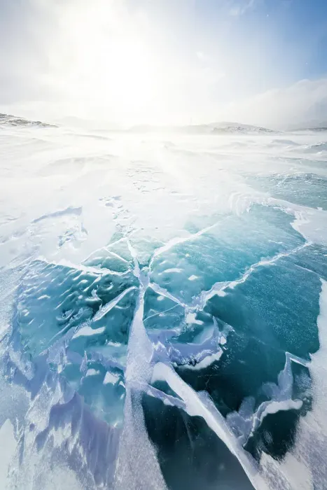 Framed Print : Cold arctic sunrise over the turquoise colored ice covering a lake, Stora Sjofallet, Norrbotten County, Lapland, Sweden