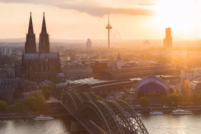 Framed Print : Cologne Cathedral at sunset and Hohenzoller Bridge over River Rhine in Cologne city