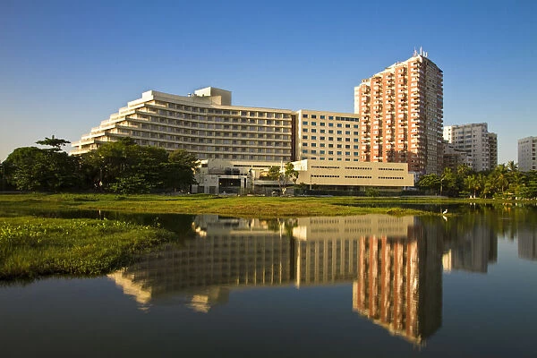Colombia, Bolivar, Cartagena De Indias, Bocogrande, El Laguit, Hilton Hotel reflecting