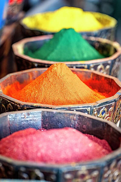 Colorful scented spices in cone shape in a row, Marrakesh, Morocco