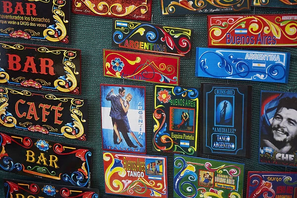 Colorful souvenirs in 'Fileteado' style on sale in a stand of the Recoleta street market (Feria de la Recoleta or Feria de Artesanos de Plaza Francia), Plaza Francia, Buenos Aires, Argentina