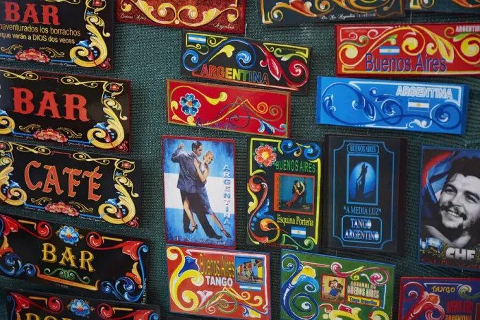 Framed Print : Colorful souvenirs in Fileteado style on sale in a stand of the Recoleta street market (Feria de la Recoleta or Feria de Artesanos de Plaza Francia), Plaza Francia, Buenos Aires, Argentina Framed Print : Colorful souvenirs in Fileteado style on sale in a stand of the Recoleta street market (Feria de la Recoleta or Feria de Artesanos de Plaza Francia), Plaza Francia, Buenos Aires, Argentina