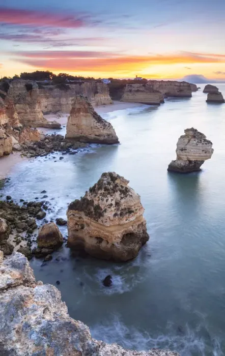 Framed Print : A colorful sunrise at the beach of Praia da Marinha, Caramujeira, Lagoa, Algarve Framed Print : A colorful sunrise at the beach of Praia da Marinha, Caramujeira, Lagoa, Algarve