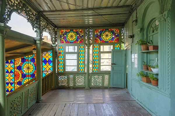 Colorful windows in the starwell of a historic Georgian home, Tbilisi (Tiflis), Georgia