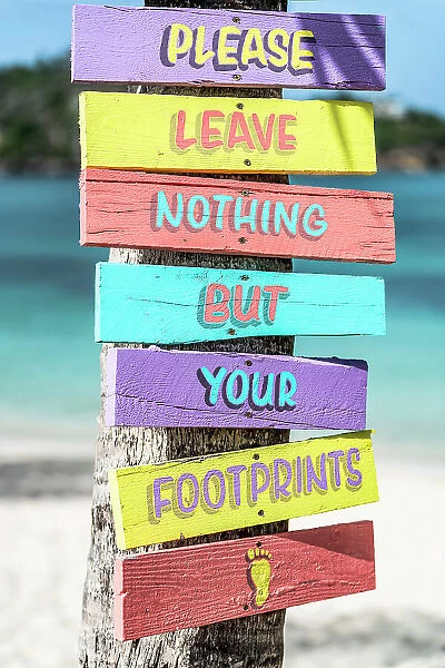 Colorful wooden beach signs on a tropical shore, Antigua, Antigua & Barbuda, Caribbean, West Indies