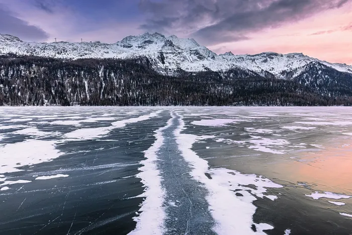 Framed Print : Colors of sunset is reflected on the frozen surface of Lej da Silvaplana. Engadine Valley, Graubunden Canton, Switzerland Framed Print : Colors of sunset is reflected on the frozen surface of Lej da Silvaplana. Engadine Valley, Graubunden Canton, Switzerland