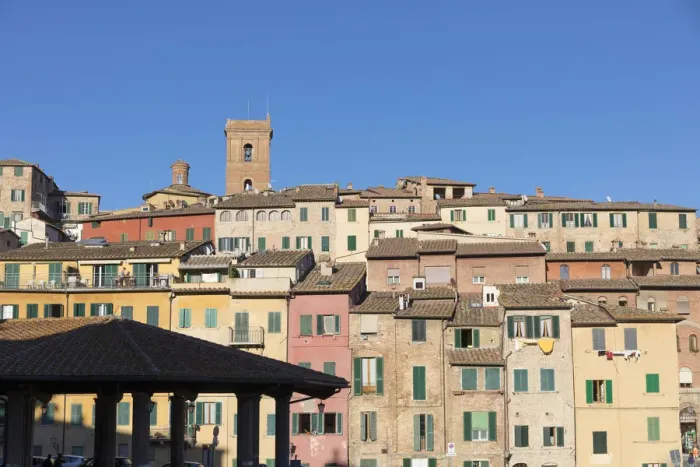Framed Print : Colourful buildings and covered market in Siena, Tuscany, Italy