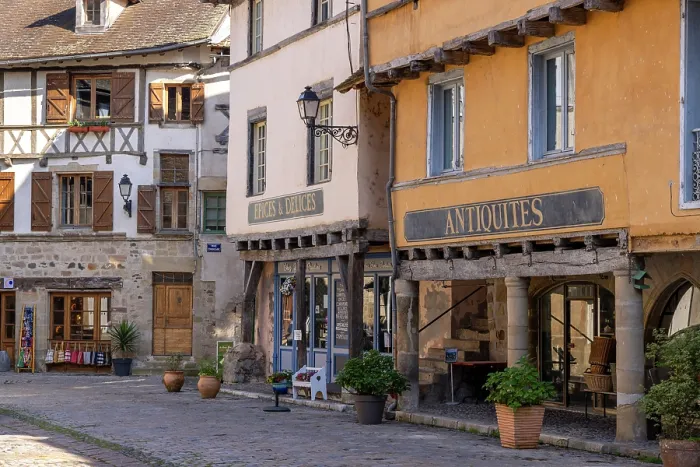 Framed Print : Colourful buildings in the main square in Beaulieu-sur-Dordogne, Correze, Nouvelle-Aquitaine, France