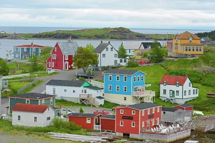 Framed Print : Colourful coastal fishing Village of Trinity on the Atlantic Ocean shoreline. Trinity, Newfoundland & Labrador, Canada Framed Print : Colourful coastal fishing Village of Trinity on the Atlantic Ocean shoreline. Trinity, Newfoundland & Labrador, Canada