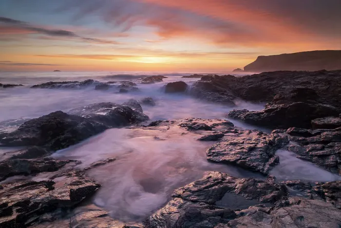 Framed Print : Colourful Cornish sunset above rocky ledges near Polzeath, Cornwall, England. Spring (April) 2018 Framed Print : Colourful Cornish sunset above rocky ledges near Polzeath, Cornwall, England. Spring (April) 2018