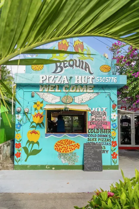 Framed Print : A colourful facade in Belmont, Bequia Island, Grenadine Islands, Saint Vincent and the Grenadines, Caribbean